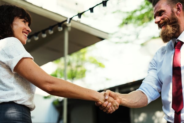 Image of Two People Shaking Hands